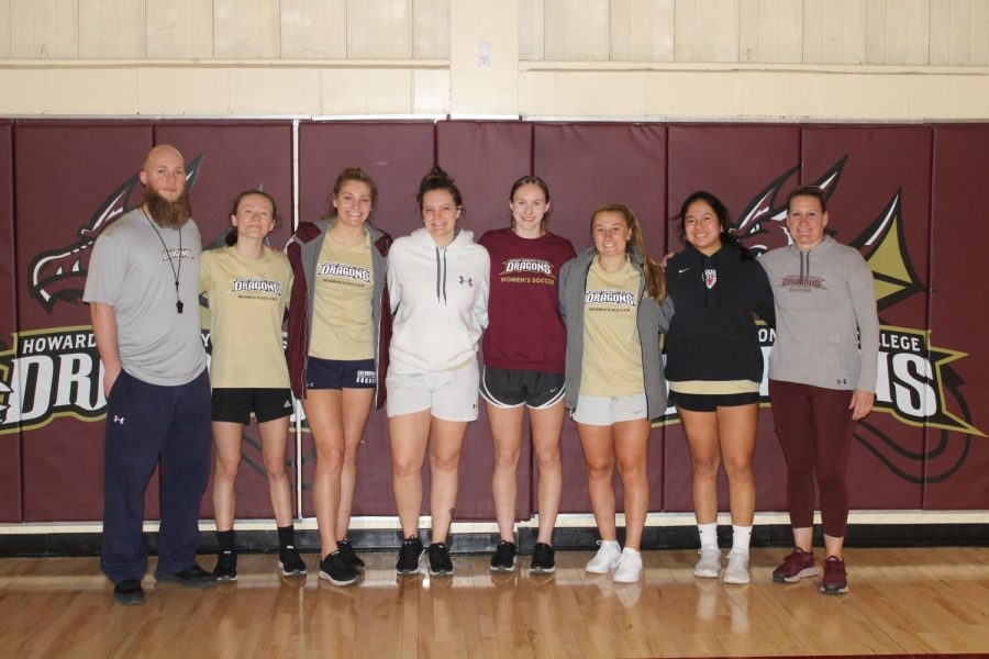 Led by coach Kate Seagroves (right), the HCC womens soccer team is just one of the many teams that benefit from the equal pay agreements increased recognition of female athletes.