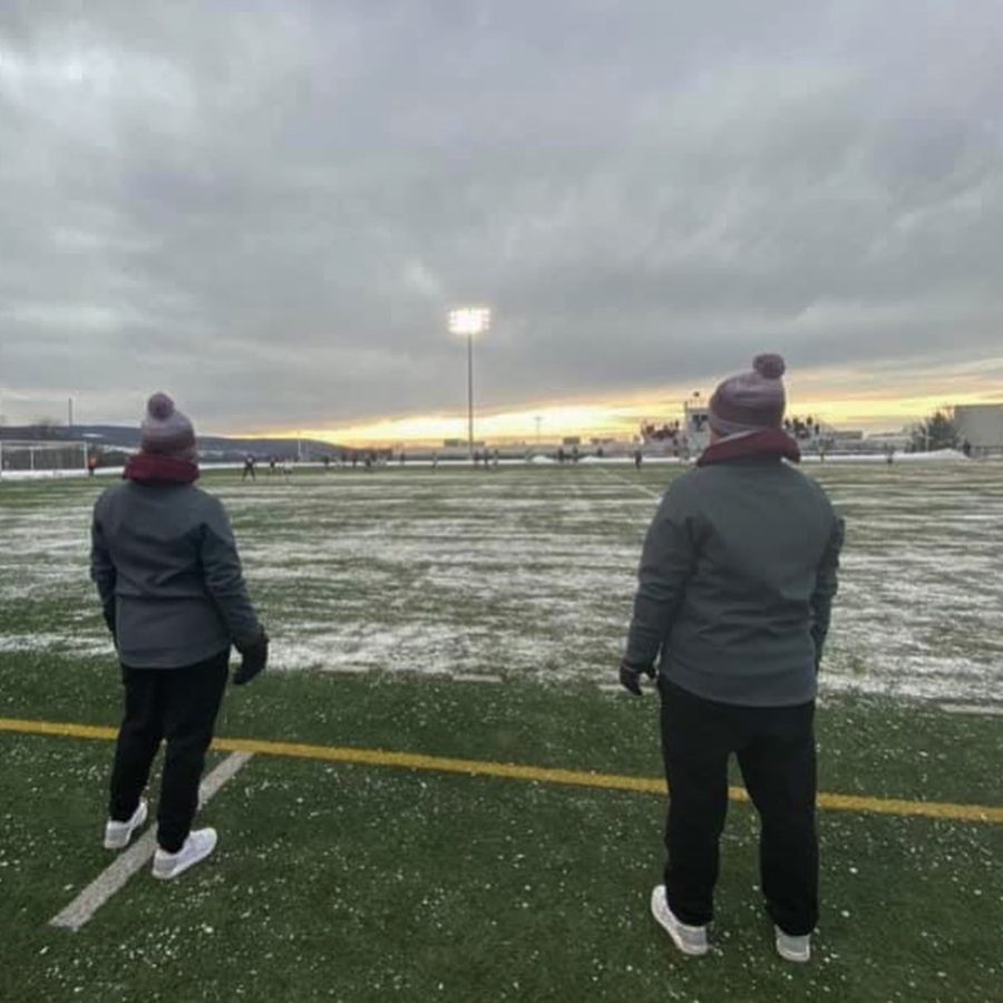 Coach Kate Seagroves, Assistant Coach Shannon Riley on HCC Turf Field.