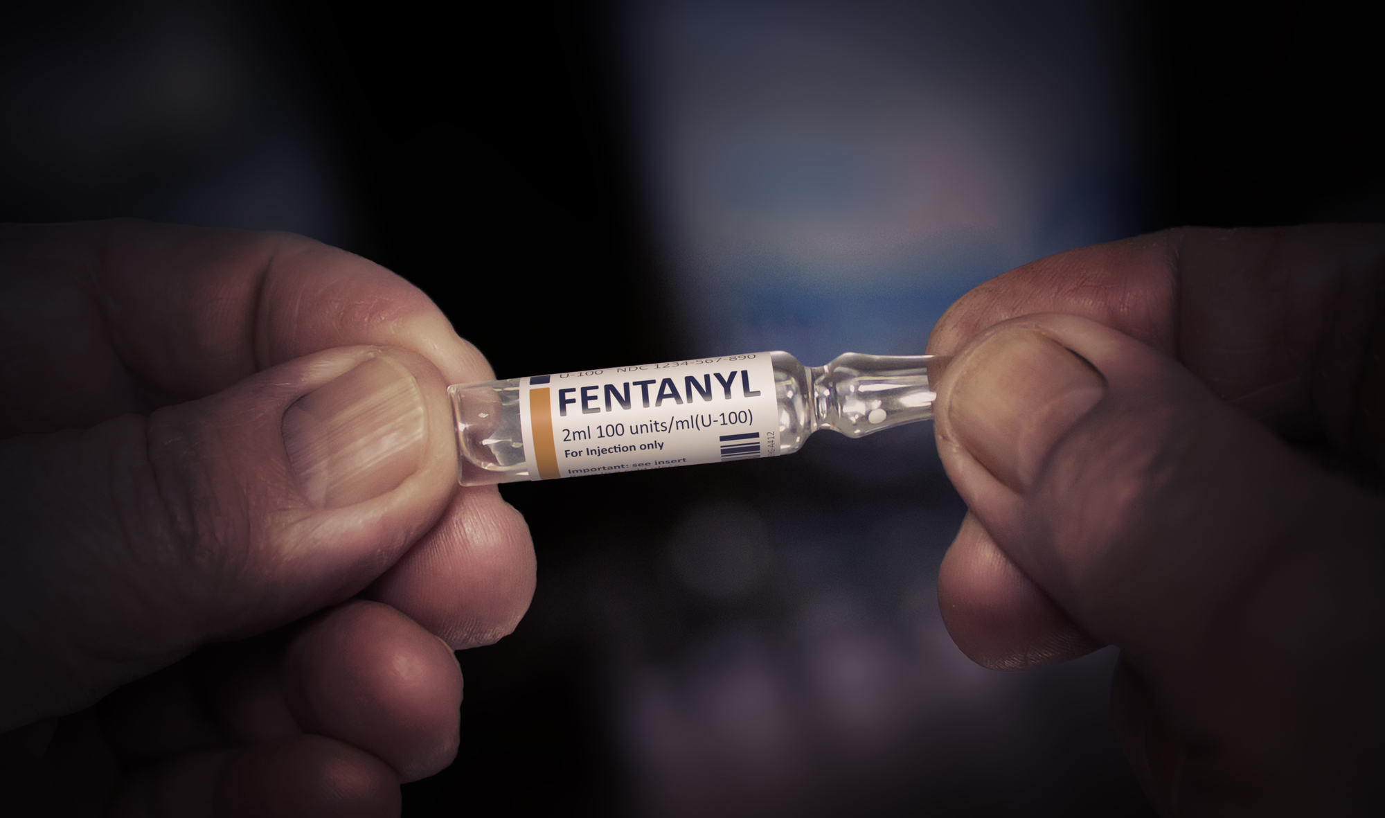 Injection of Fentanyl. Glass Ampoule in a Hands of an Old Man. 